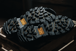 Proprietary Muddy Outsoles